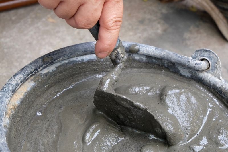 a bucket of concrete mix