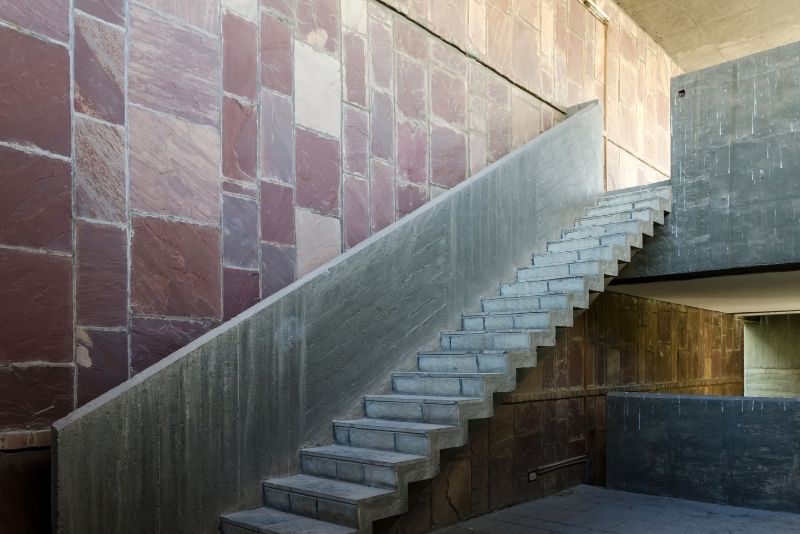 a picture of a concrete stairway and a concrete wall