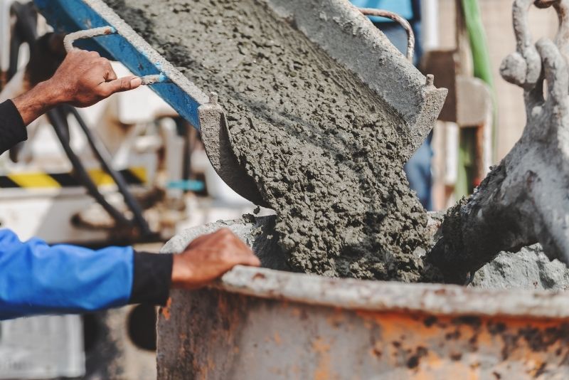 concrete mixer pouring on a huge drum